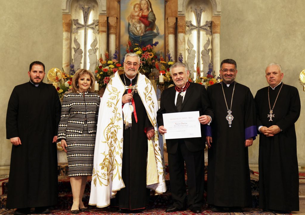 Arsen Danielian, Esq., receives Medal of the Order of Saint Sylvester from His Excellency the Most Rev. Bishop Mikael Mourdian, Bishop of the Armenian Catholic Church in the U.S. and Canada, assisted by the Very Rev. Father Parsegh Baghdasarian.